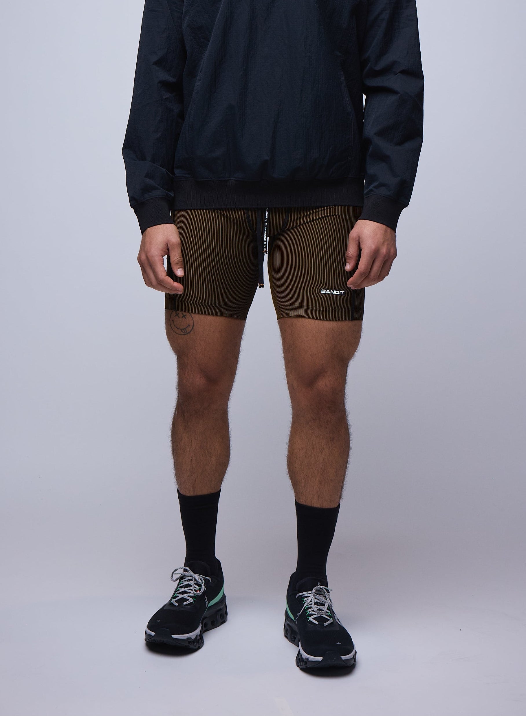 MENS STRIPED CADENCE™ 7 POCKET HALF TIGHTS